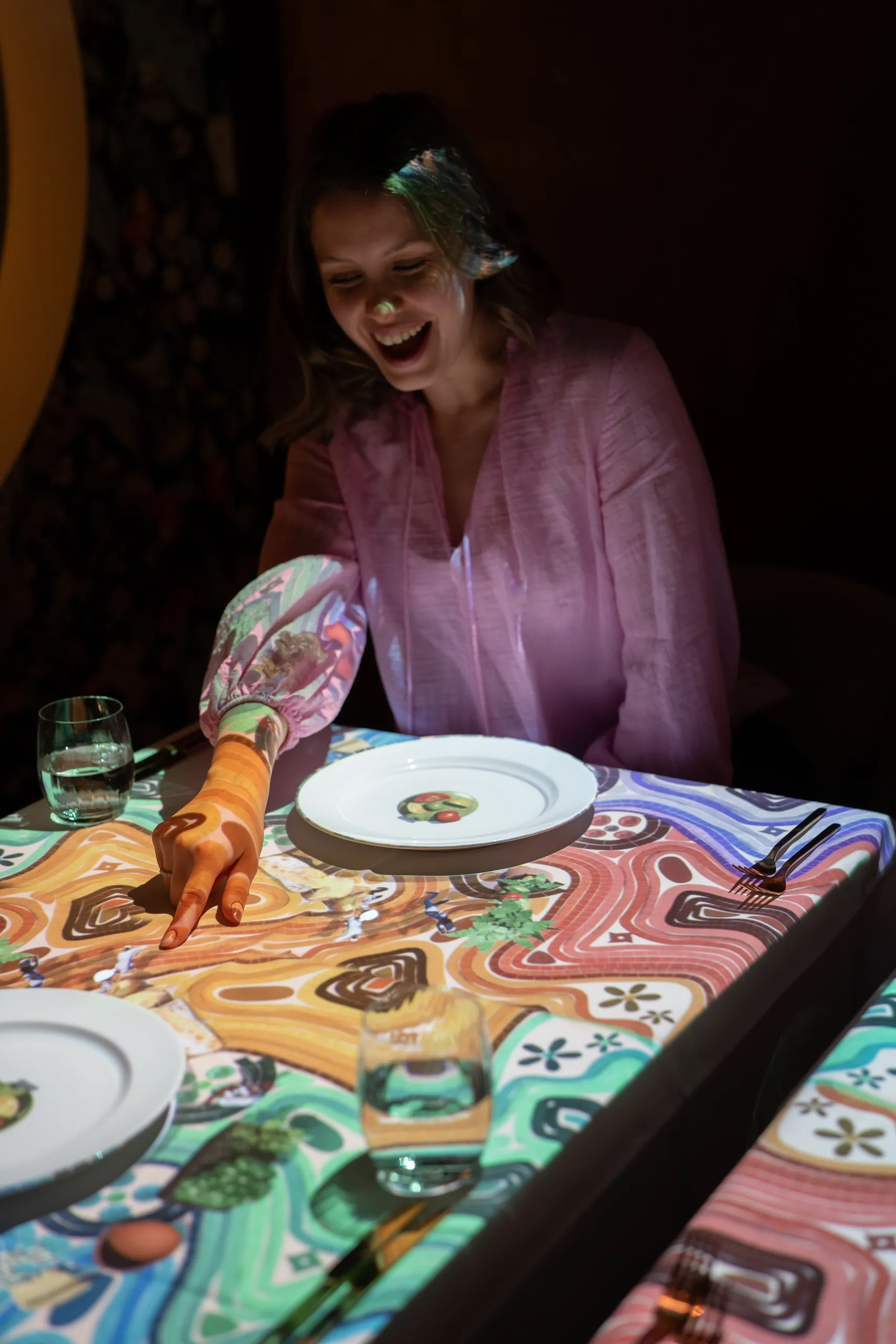 Guest enjoying the Le Petit Chef dinner experience